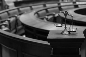 Symbol of law and justice in the empty courtroom, law and justice concept.